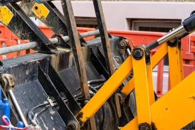 Construction workers at construction site and heavy duty bulldozer in Bucharest, Romania, 2023