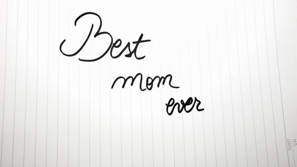 Best mom ever writing love text for mother on paper. Label tag with lovely message for mother`s day.