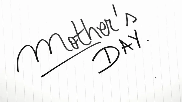 Mother`s day writing love text for mother on paper. Label tag with lovely message for mother`s day.