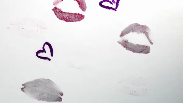 Valentine`s day concept. Lipstick kiss. Drawing with lipstick on paper.