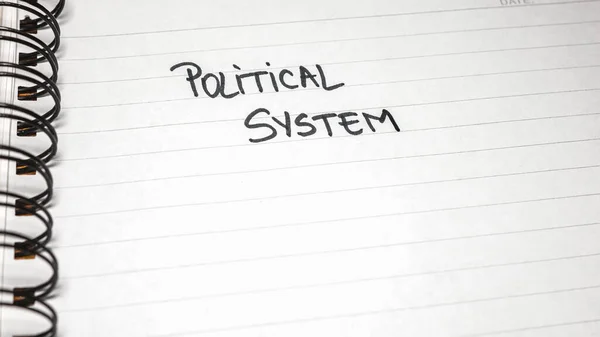 Political system, handwriting  text on paper, political message. Political text on office agenda. Concept of democracy, voting, politics. Copy space.