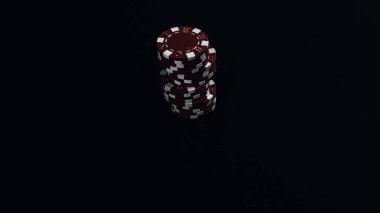 Yüksek bahisli kumarhane oyunları için bir yığın poker fişi.