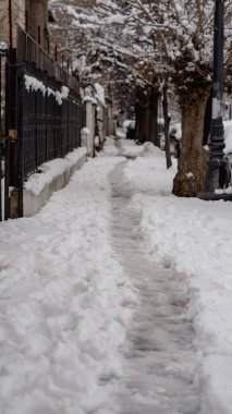 First day of winter, heavy snow in Bucharest city, Romania clipart