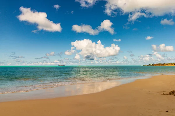 stock image Caribbean beach with white sand, deep blue sky and turquoise water