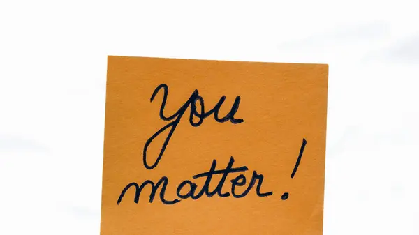 You matter handwriting text close up isolated on orange paper with copy space.