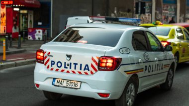 Bükreş 'te yoğun saatlerde Romen Polis Arabası trafikte
