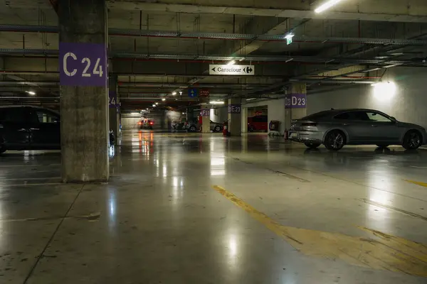 stock image Cars parked at underground parking garage