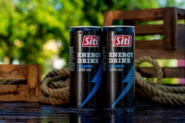 Siti energy drink can - condensation water droplets, outdoors background clipart