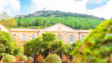 Fontfroide Abbey or Abbaye de Fontfroide is monastery in France gothic walls and arches clipart