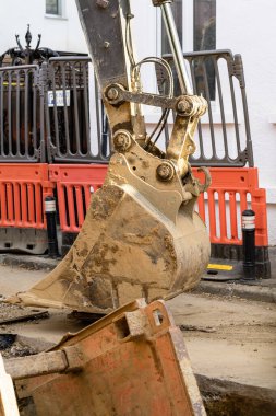Construction workers at construction site and heavy duty bulldozer in Bucharest, Romania, 2023