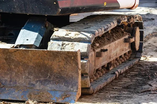 İnşaat alanında çalışan endüstriyel kazıcıların ayrıntıları