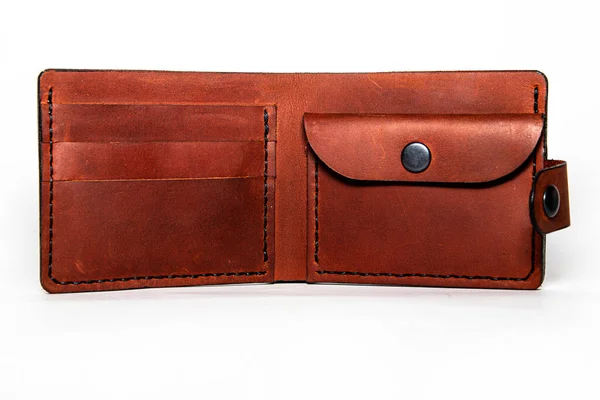 Close-up of a handmade leather wallet, classic brown. Leather craft.