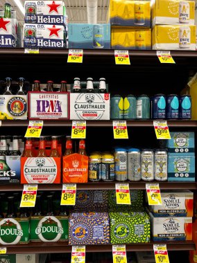 Selection of non-alcoholic beers on the shelf in the liquor department of a Jewel-Osco grocery store in the Chicago area