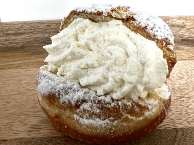 Paczki with banana cream filling - Pczki are filled doughnuts found in Polish cuisine and usually eaten on Fat Tuesday before Lent begins.