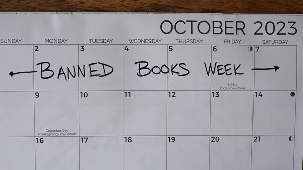 Banned Books Week marked on a calendar for the first week of October 2023. Banned Books Week was launched in 1982 in response to the rising number of challenges to books in schools and libraries.