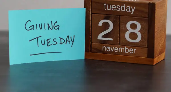 关于2023年11月28日星期二给予的日历提醒 星期二的捐赠是一个全球性的运动 在假日购物季节释放出激进慷慨的力量 免版税图库照片