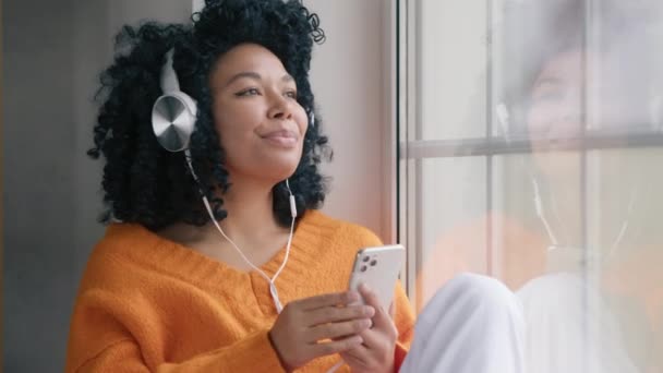 Close Relaxed Young Afro American Woman Listening Browsing Music Sitting — Video
