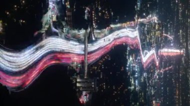 Vertical 9:16 mobile content Beautiful top view time-lapse of car traffic at 405 highway and buildings in Los Angeles USA. 4K urban cityscape concept of innovations, financial technology, energy power