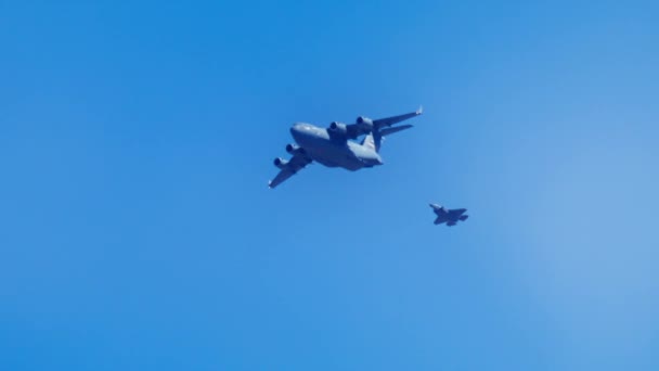 Large Military Transport Aircraft Flying Together Fighter Jet United States — 비디오