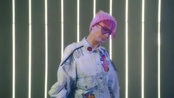 Dancing Hipster Woman Funky Pink Beanie Hat Modern Glasses Listening — Vídeos de Stock