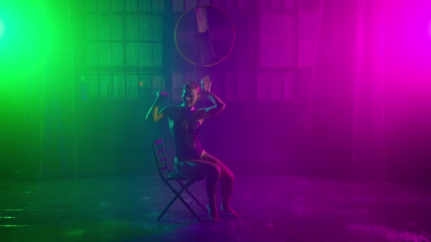 Slim Woman Performing Erotic Dance Tricks Sensually Colorful Spotlights Sexy — Stockvideo