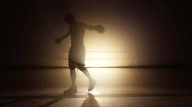 Close-up shot of intense boxing workout for building lean body muscles. Portrait of unrecognizable male athlete warming up before a sparring. High quality 4k footage