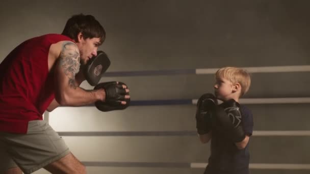 Portrait Man Teaching Little Boy Boxing Gloves How Kick Punch — Stockvideo