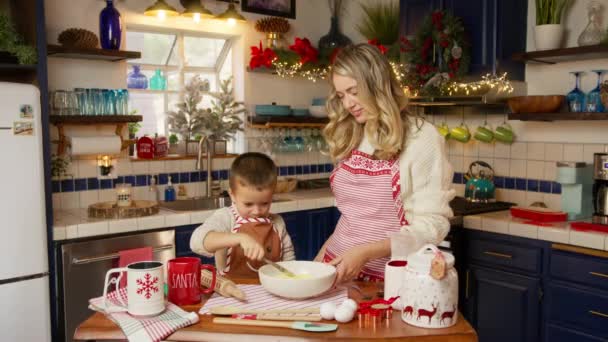 Mother Adorable Boy Celebrating New Year Young Blonde Woman Helping — Stock Video