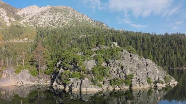 Stunning Mountain Stands Tall Front Crystal Clear Lake Showcasing Breathtaking Stock Footage