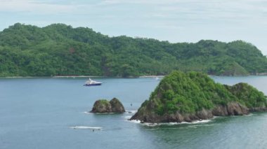 Puntarenas, Kosta Rika 'nın büyüleyici hava manzaralarını keşfedin. Güzel manzaralar ve güzel kıyı şeritleri unutulmaz deneyimler arayan maceracılar için mükemmel bir yer oluşturur.