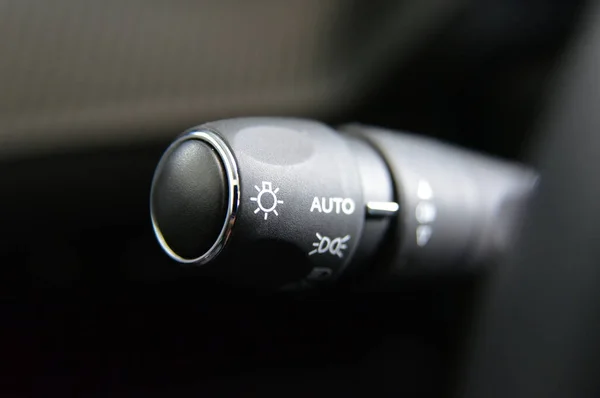 Closeup image of car lighting control switch