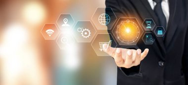 Hand holding a clock or stopwatch is a business concept. time management, planning, life control