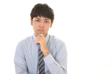 Çene üzerinde el ile düşünme adam