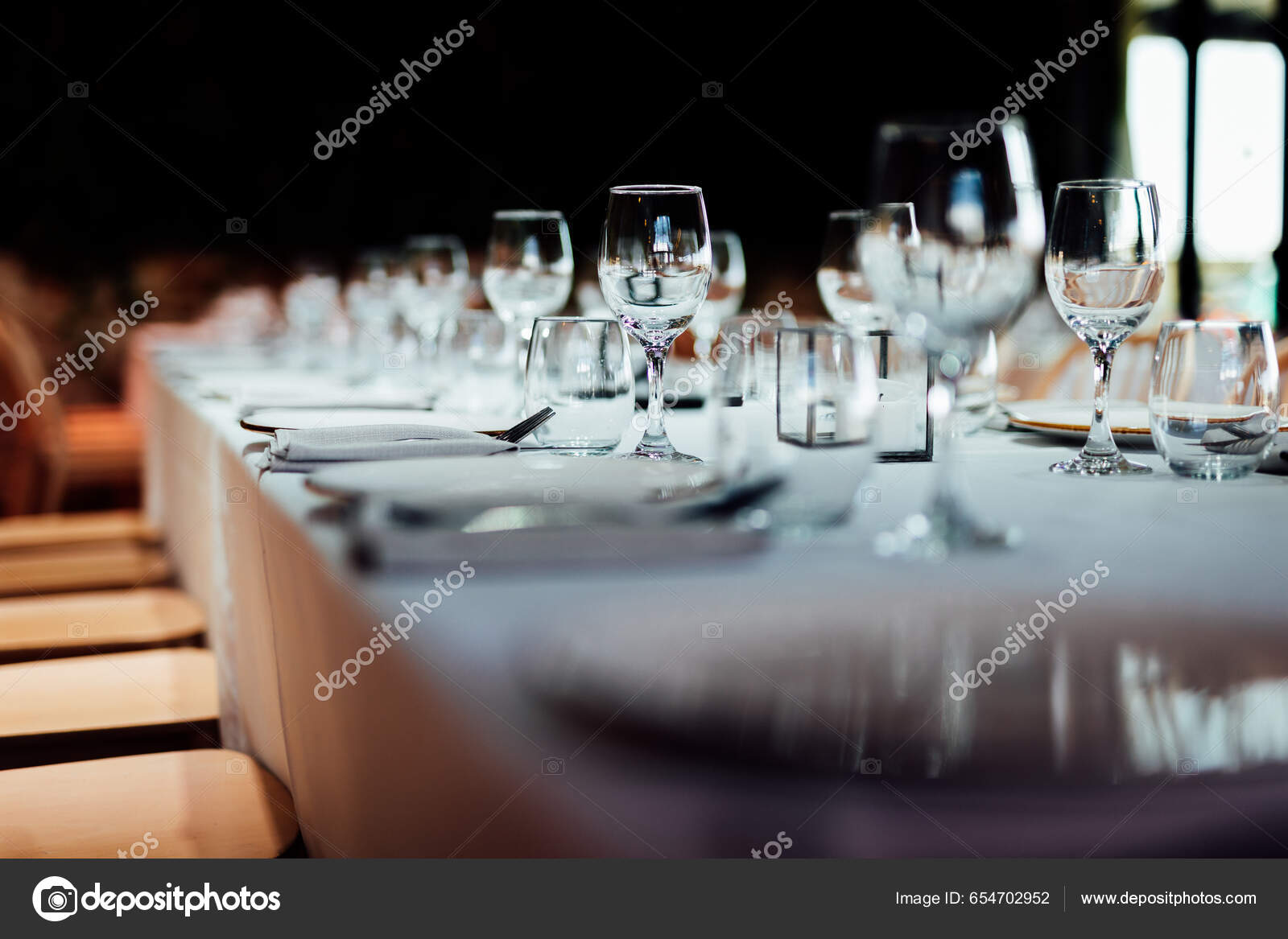 Luxury table settings for fine dining with and glassware, pouring