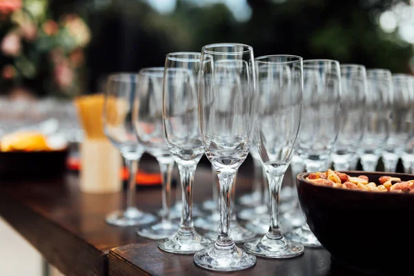 stock image Luxury table settings for fine dining with and glassware, pouring wine to glass. Beautiful blurred background. Preparation for holiday wedding. Fancy luxury restaurant.