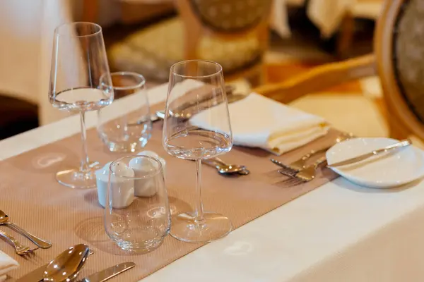 Luxury table settings for fine dining in romantic LUXURY Restaurant.  For events, weddings and celebration.