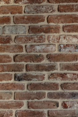 Tuğla duvar turuncu kırmızısı duvar kağıdı ya da arka plan olarak kullanılabilir. Beutifrl yumuşak ışık. 2024 hisse eğilimi.