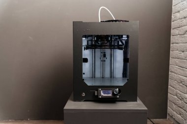 Modern 3D printer homemade in the process. Printing parts on a 3D printer at home. Modern technologies.