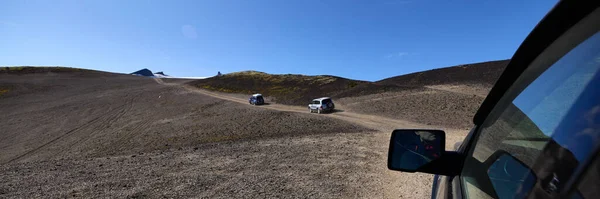 stock image Two Mitsubishi Pajero off-road vehicles climbing the Snfellsjkull stratovolcano. The view from the third car behind them. Snaefellsnes Peninsula, Iceland, 14.08.2021