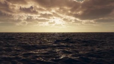 Beautiful sunset landscape clouds over the sea. Timelapse of clouds and storm on the sea.