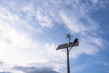 Solar energy panels power. Renewable photovoltaic technology with solar energy power panel and wind turbine. Alternative energy sources concept