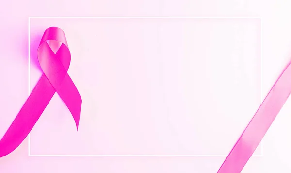 Cancer awareness. Health care symbol pink ribbon on white background. Breast woman support concept. World cancer day