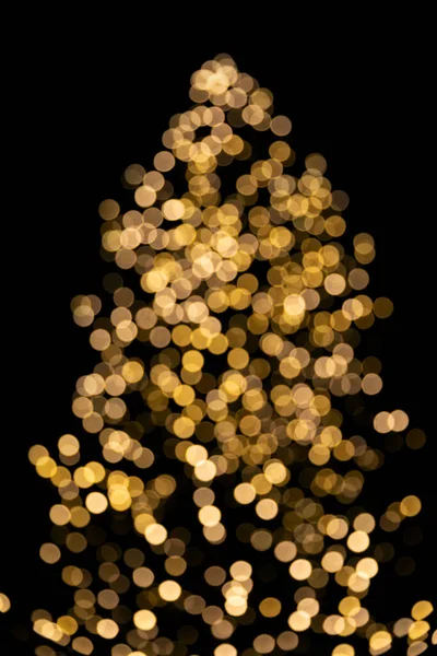 Bokeh Zlatá Světla Vánoční Strom Izolované Černém Pozadí — Stock fotografie