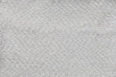 El yapımı, bej, fildişi ve krem rengi yün kumaş dokusu. Tekstil arkaplanı, üst görünüm, kopyalama alanı