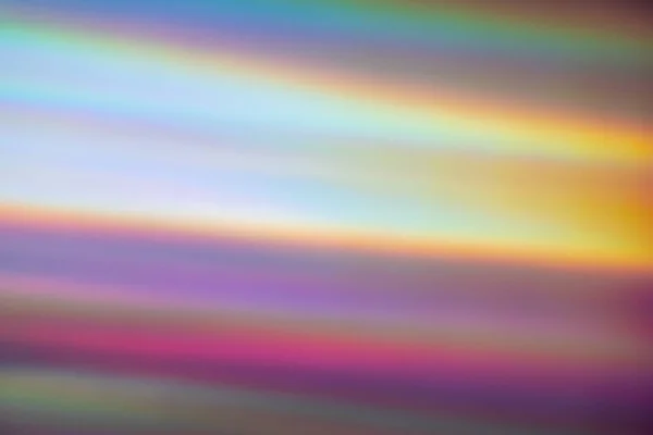 Abstract background. Blurred holographic rainbow colors, light reflection