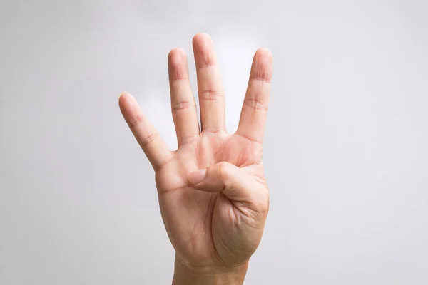 Mano Mostrando Cuatro Dedos Sobre Fondo Blanco — Foto de Stock