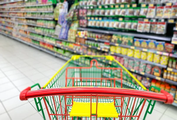 Supermarket Aisle Empty Shopping Cart Blur Background Royalty Free Stock Photos