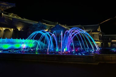 Beijing, China - Oct 22nd, 2024: The Great Wall Music and Dance Water Show at Gubei Water Town. A famous travel destination. clipart