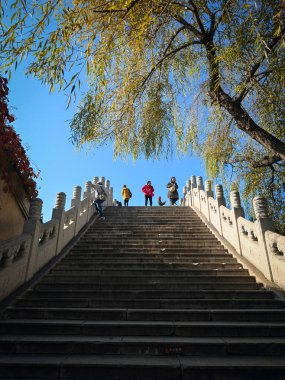 Beijing, China - Oct 23rd, 2024: Street view of Gubei Water Town during autumn season. A famous travel destination. clipart