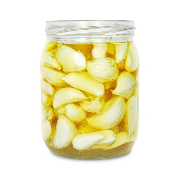 stock image garlic in a jar with honey isolated on a white background